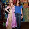 Star Sighting: Mandy Moore Poses with Rapunzel at Disneyland Resort